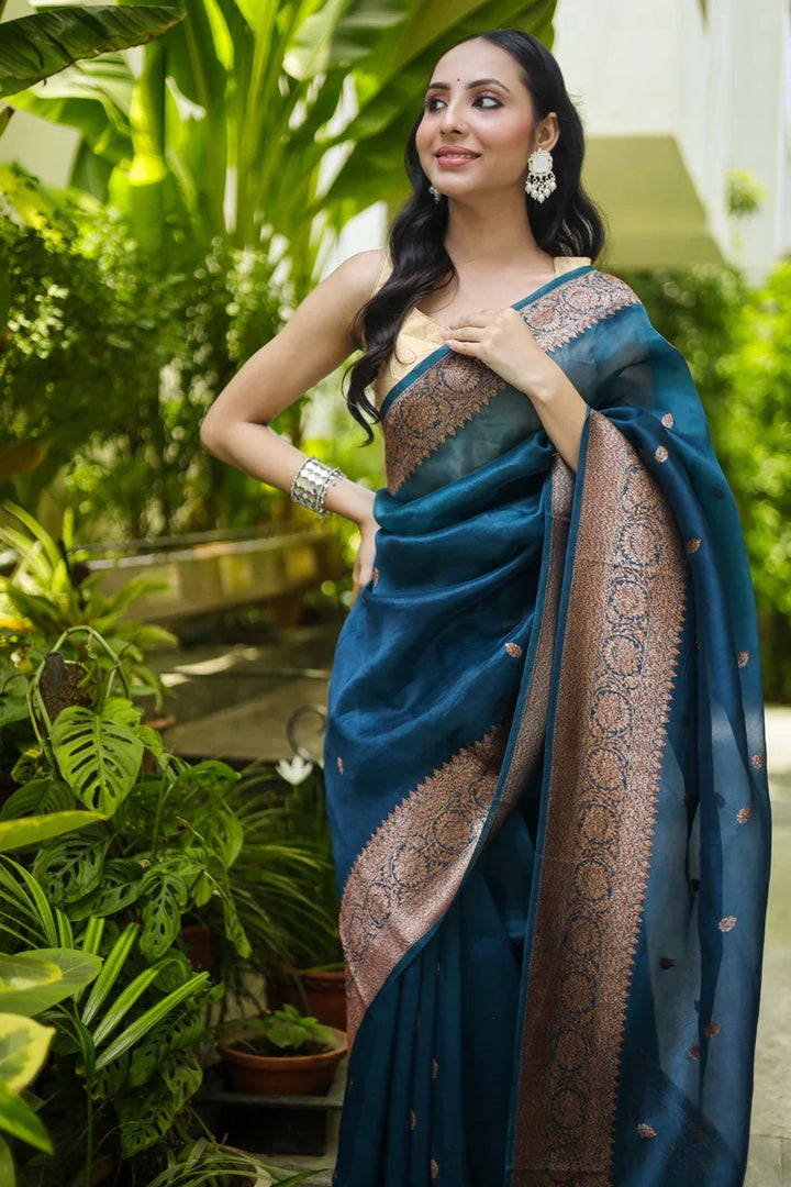 Teal Kora Silk Handloom Banarasi Saree with Kadhwa Motifs