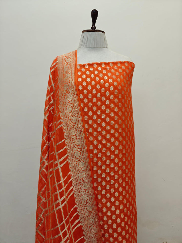 Orange Banarasi 2-piece suit with golden zari buti kurta and jaal dupatta