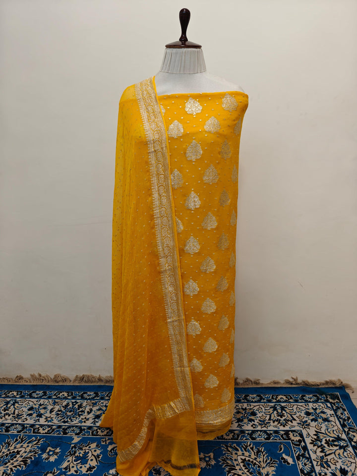 Yellow Banarasi chiffon georgette 2-piece suit with silver zari work