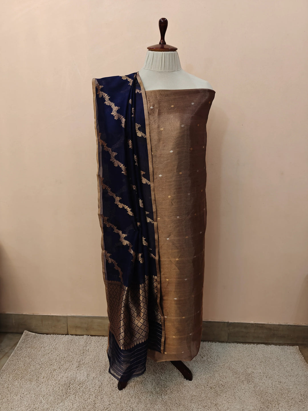 Navy Blue Banarasi Tissue Silk suit with golden and silver Kadhwa butis on the kurta, paired with a Kora silk dupatta featuring intricate jaal work.