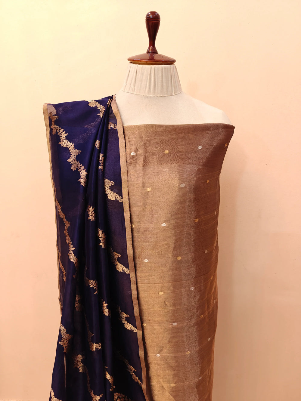 Navy Blue Banarasi Tissue Silk suit with golden and silver Kadhwa butis on the kurta, paired with a Kora silk dupatta featuring intricate jaal work.