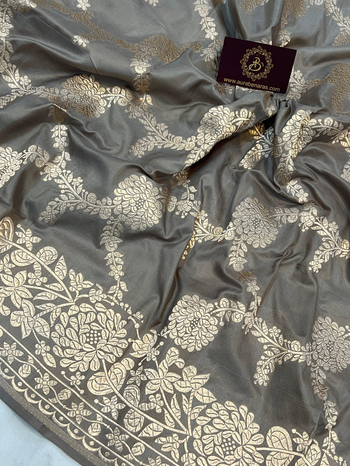 Detailed floral jaal woven in light golden zari on pure Katan silk handloom Banarasi saree