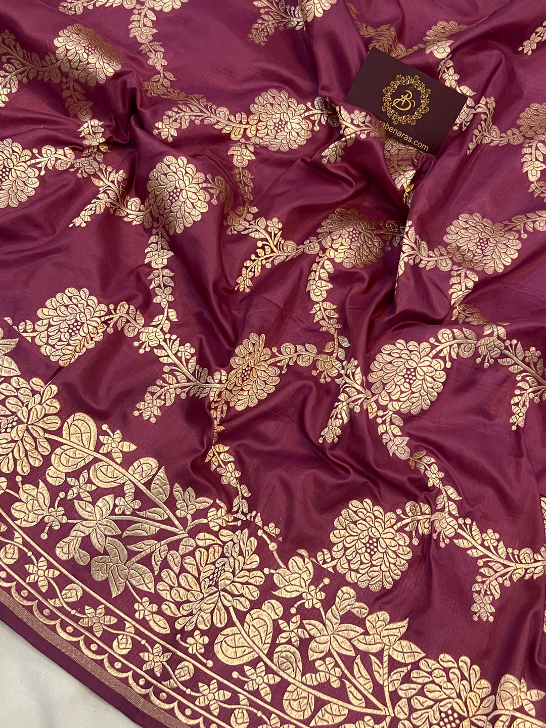 Detailed floral jaal woven in light golden zari on pure Katan silk handloom Banarasi saree