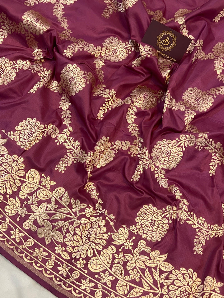 Detailed floral jaal woven in light golden zari on pure Katan silk handloom Banarasi saree