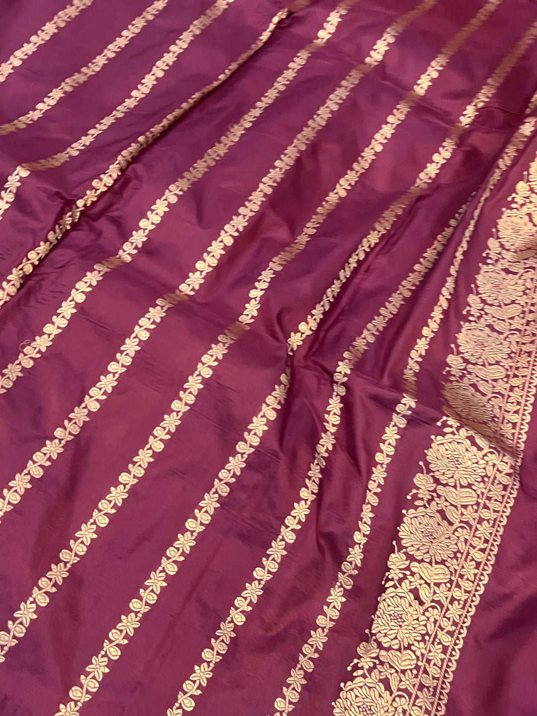 Plain blouse piece with golden zari lines included with the pure Katan silk Banarasi saree