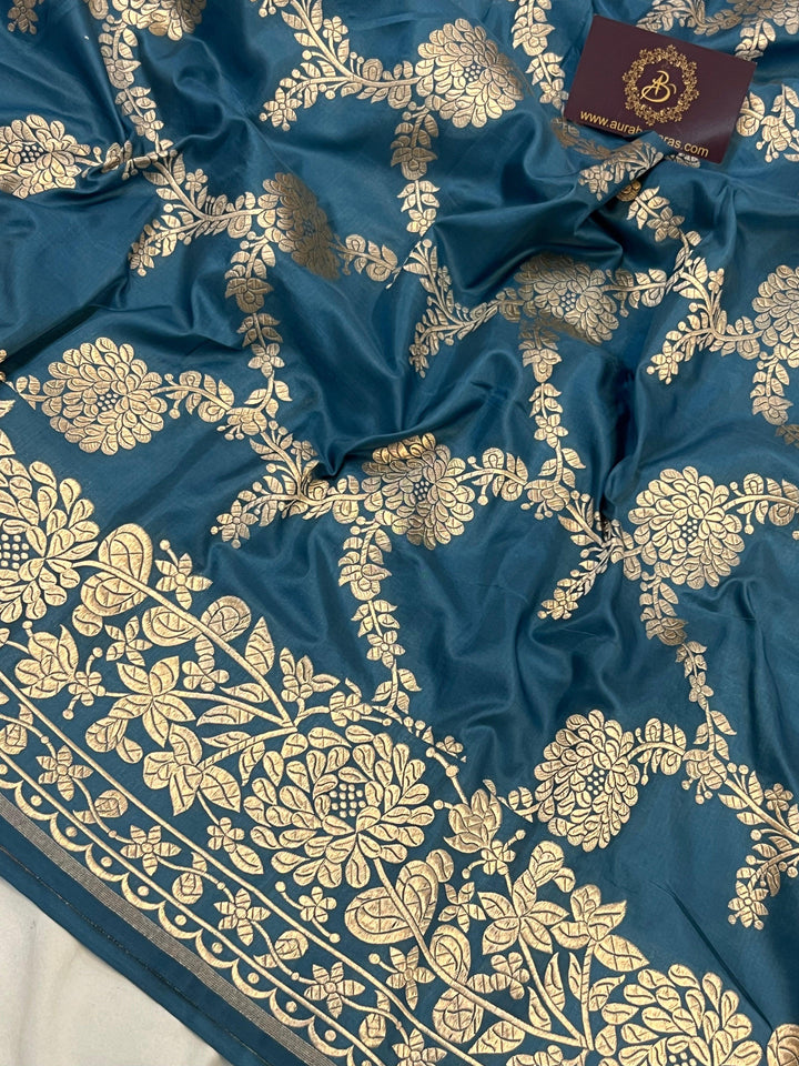 Detailed floral jaal woven in light golden zari on pure Katan silk handloom Banarasi saree