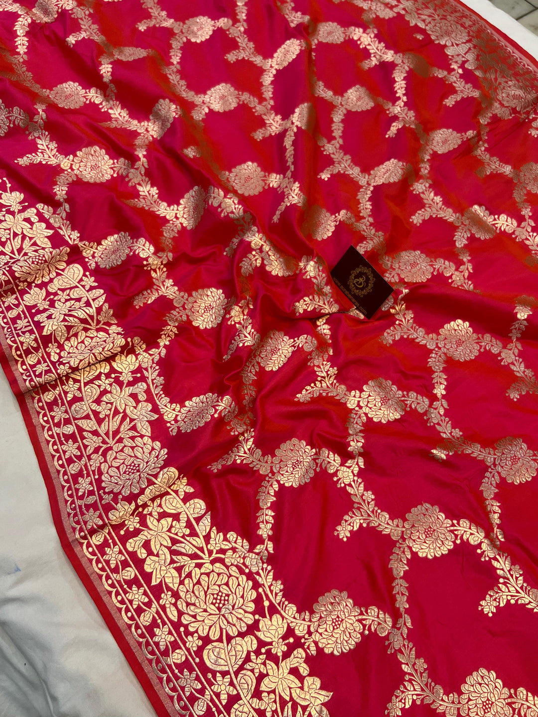 Pure Katan silk handloom saree draped with light golden zari floral jaal and elegant border
