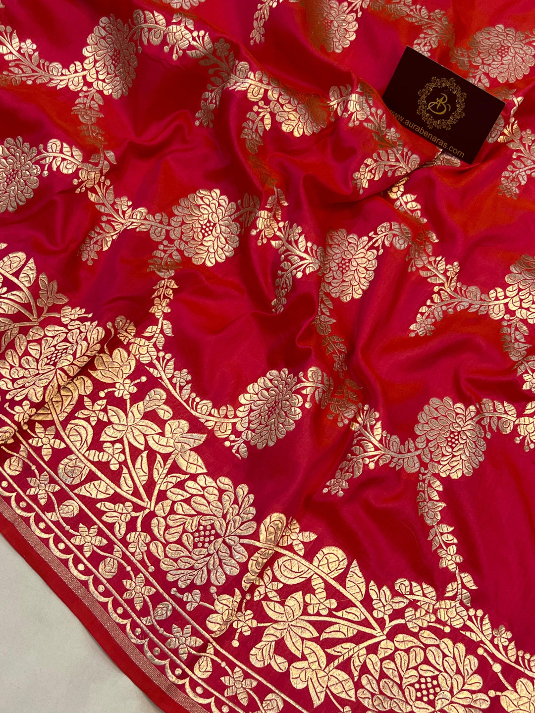 Detailed floral jaal woven in light golden zari on pure Katan silk handloom Banarasi saree