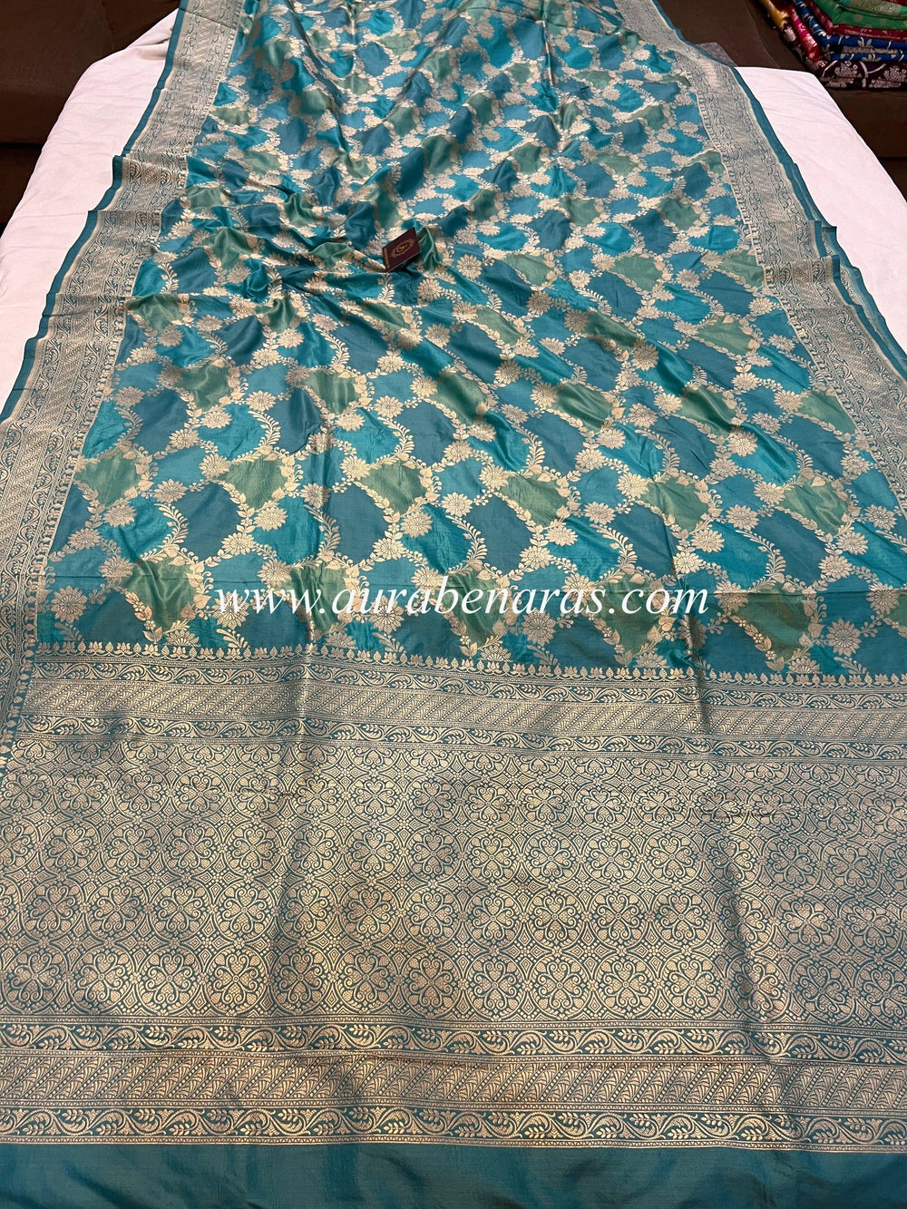 Pure Banarasi Rangkaat Katan silk saree with cutwork golden zari jaal in multicolor weave