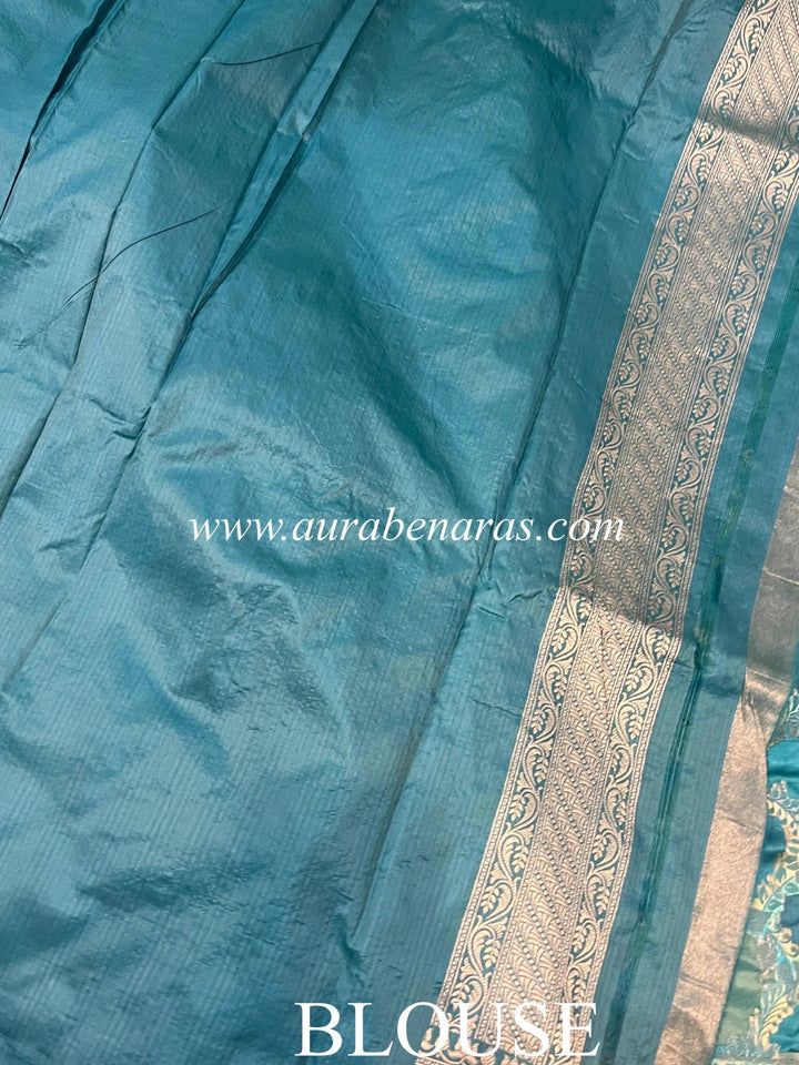 Plain blouse piece with matching border included with Rangkaat Banarasi Katan silk saree