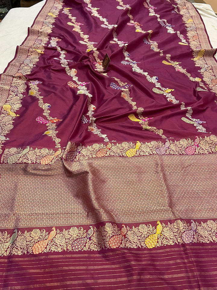Detailed pallu of Banarasi Katan silk saree with vibrant Meenakari and gold zari border – available online