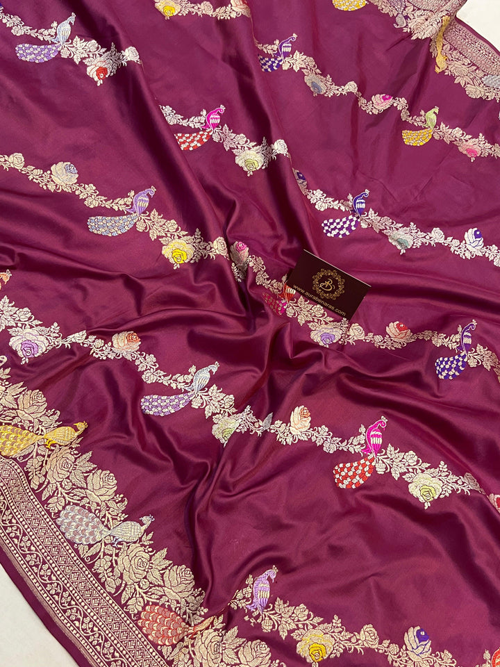 Meenakari peacock motif with enamel-style detailing on Banarasi silk saree – Kadhwa weave craftsmanship