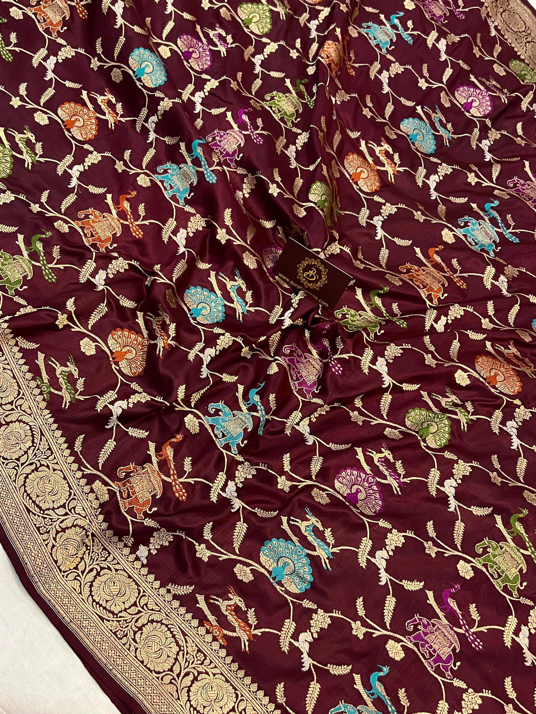 Sona Rupa zari with Meenakari highlights on Banarasi Katan silk saree showing enamel-like detailing