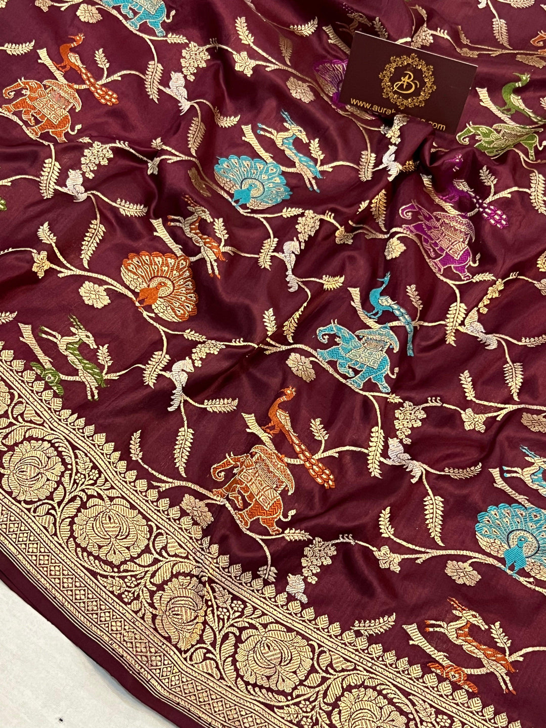 Pure Banarasi handloom Katan silk saree showcasing Shikargah motifs with Meenakari detailing and Kadhwa weaving
