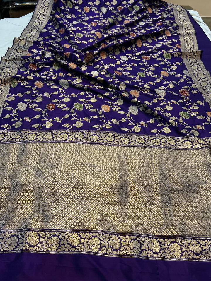 Intricate Kadhwa Jaal weave in floral and geometric pattern on pure Banarasi silk saree