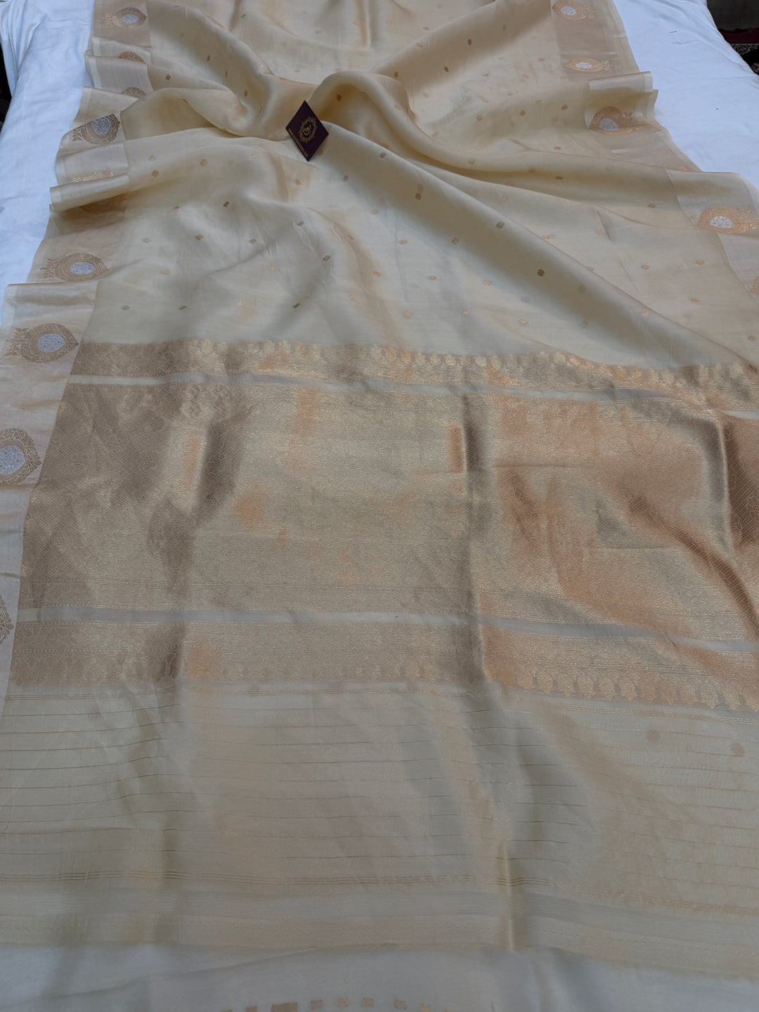 Cream Kora Silk Banarasi Saree with Kadhwa Golden Zari Motif