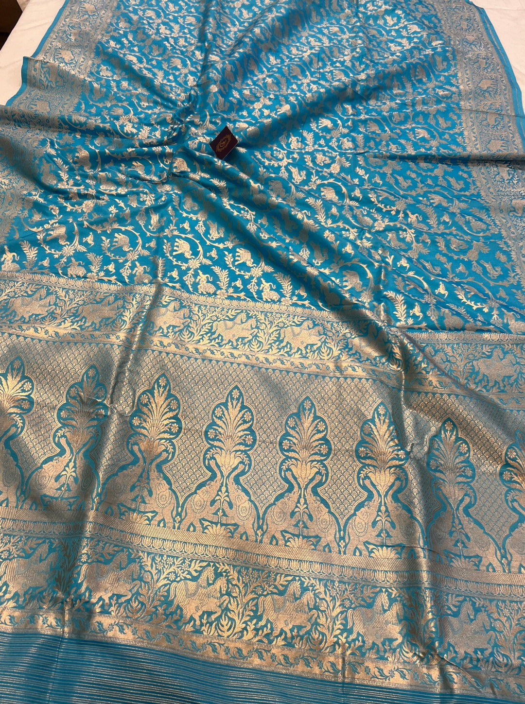 Pure Katan silk Banarasi saree with Shikargaah design, cutwork weaving, and Kadhwa border