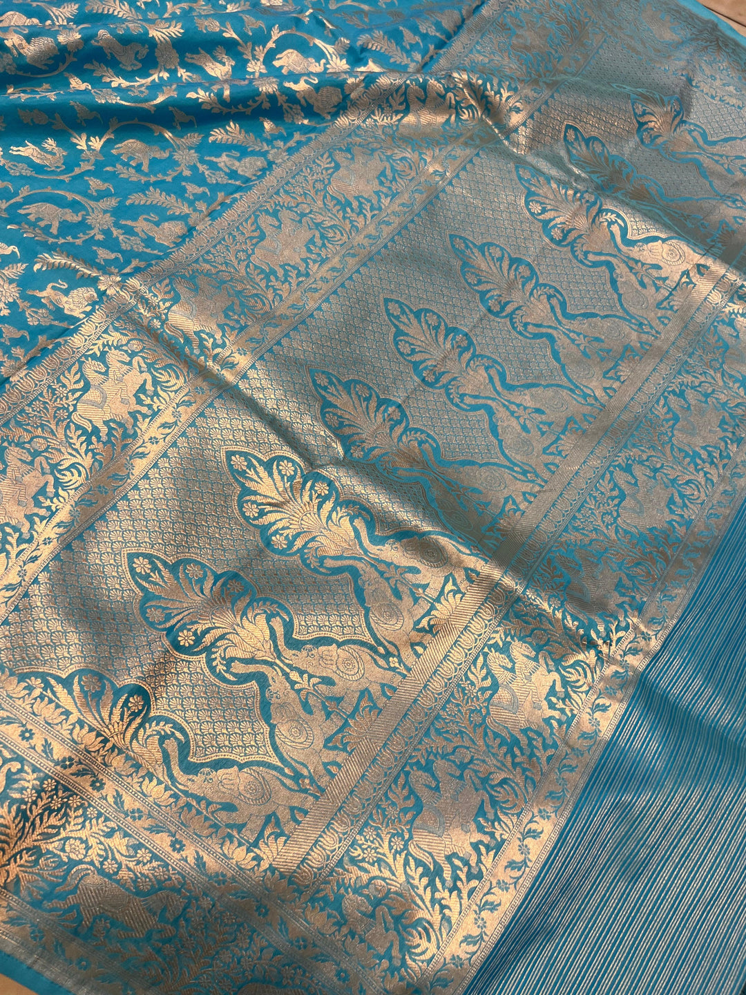 Shikargaah motif pallu with fine cutwork weaving on a Banarasi handloom saree