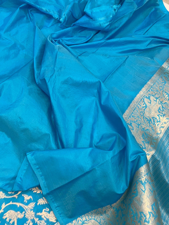 Plain unstitched blouse included with pure Katan silk Banarasi saree

