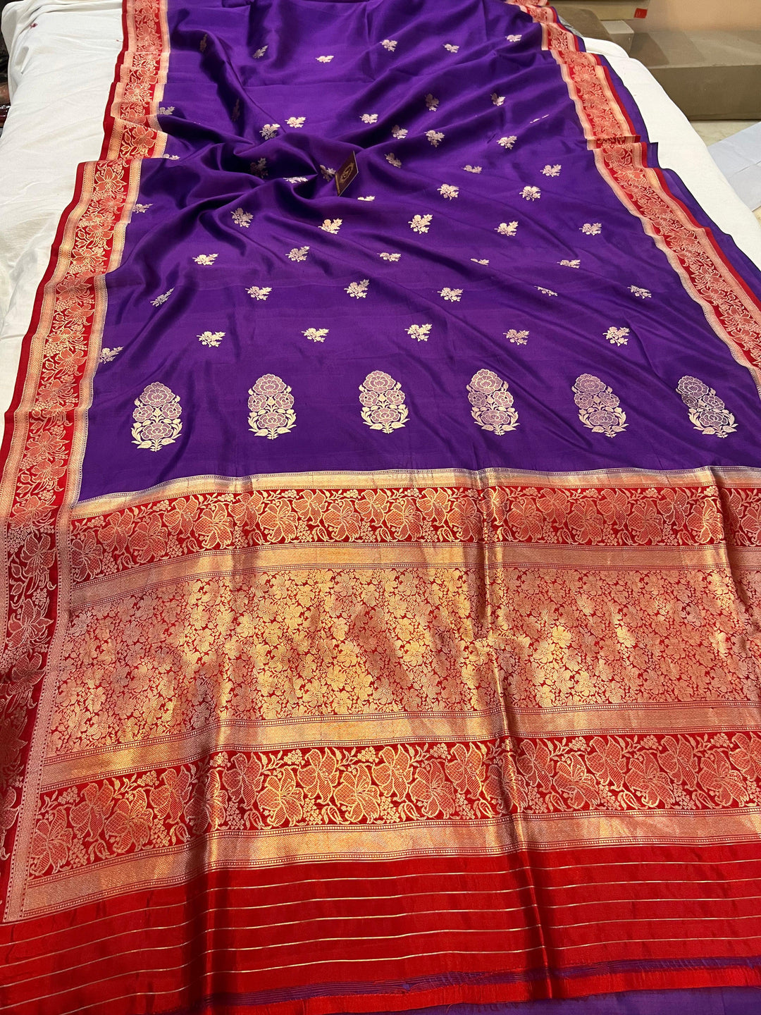 Pure silk Banarasi handloom saree with Kadhwa floral motifs and golden zari border