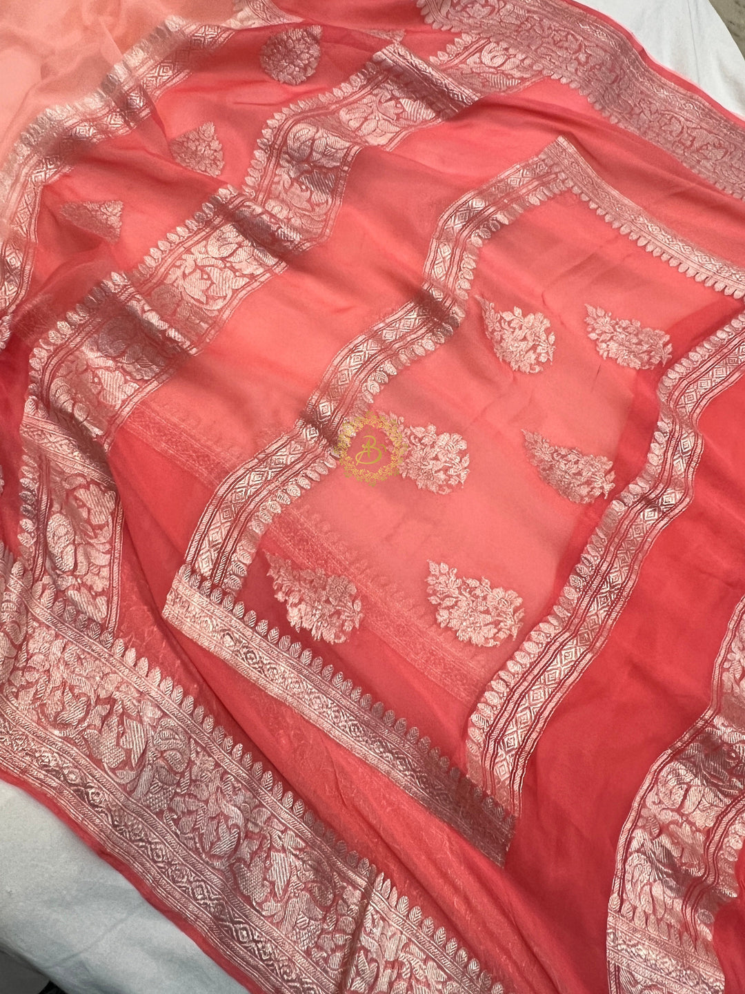 Light Peach With Dark Peach Contrast Pure Khaddi Chiffon Banarasi Saree with Kadhwa Silver Zari