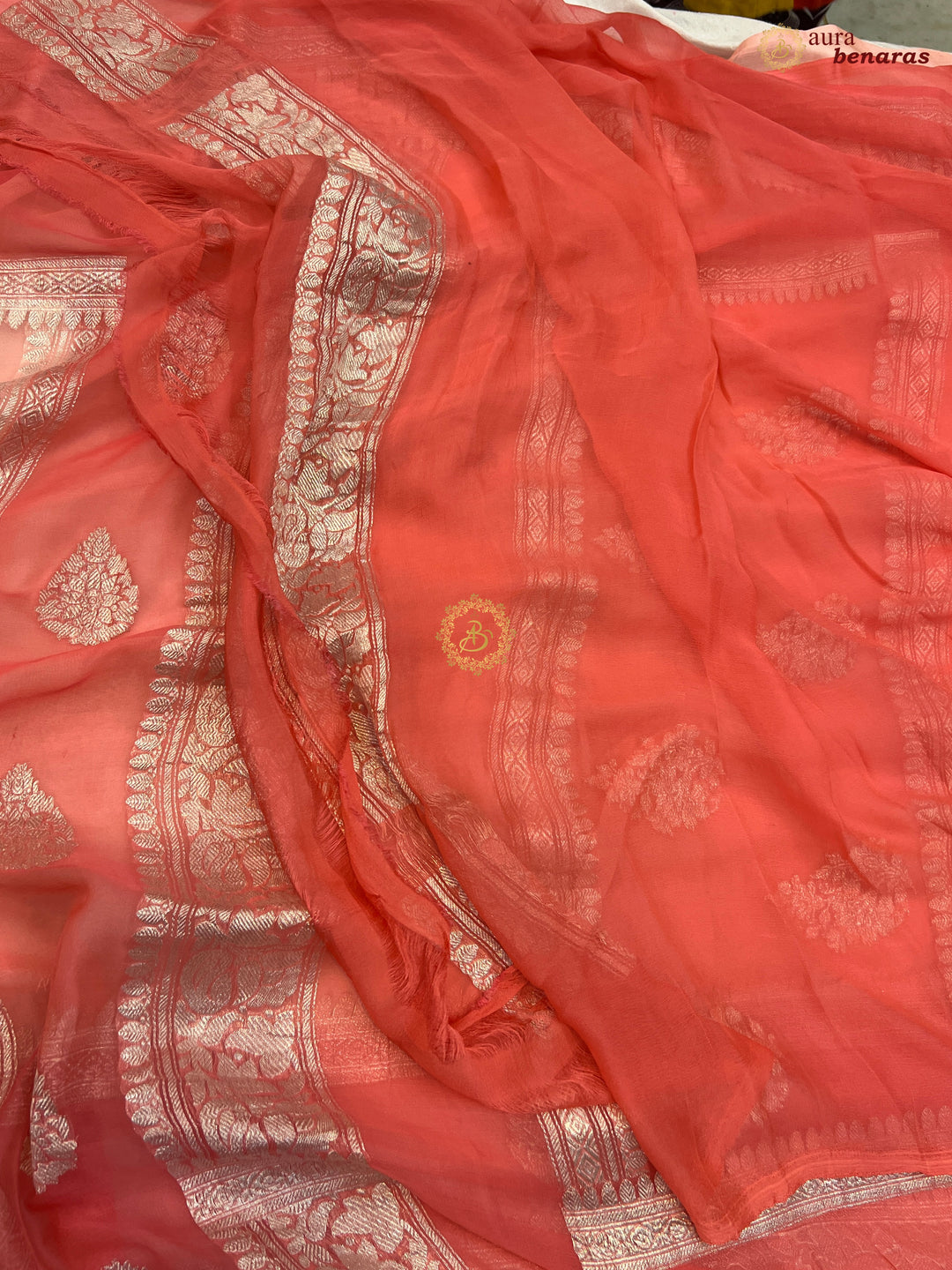 Light Peach With Dark Peach Contrast Pure Khaddi Chiffon Banarasi Saree with Kadhwa Silver Zari