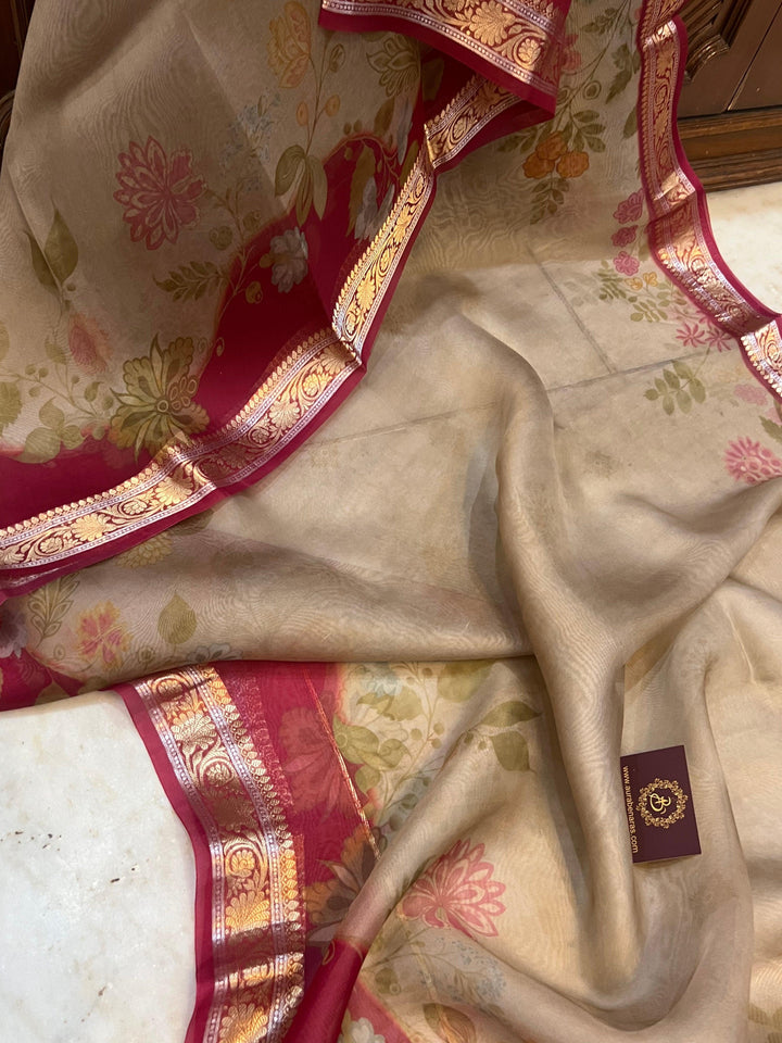 Pure Banarasi Kora silk saree with floral digital print, golden zari Banarasi border, and matching Chiniya silk blouse piece—ideal for festive and elegant occasions.