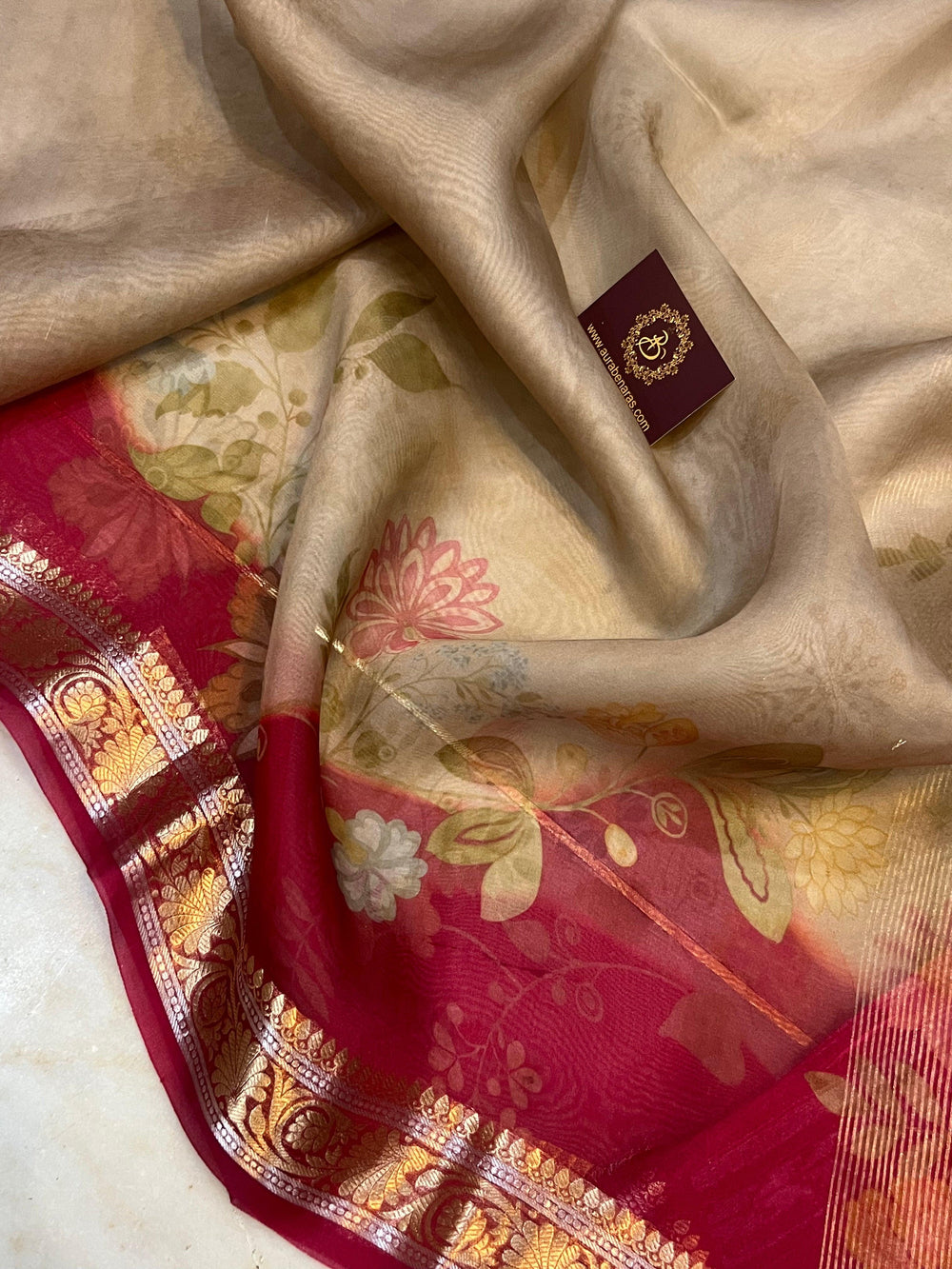 Pure Banarasi Kora silk saree with floral digital print, golden zari Banarasi border, and matching Chiniya silk blouse piece—ideal for festive and elegant occasions.