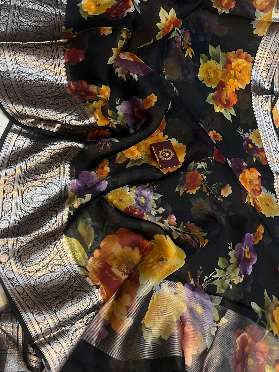 Pure Banarasi Kora silk saree with floral digital print, silver zari Banarasi border, and matching Chiniya silk blouse piece—ideal for festive and elegant occasions.