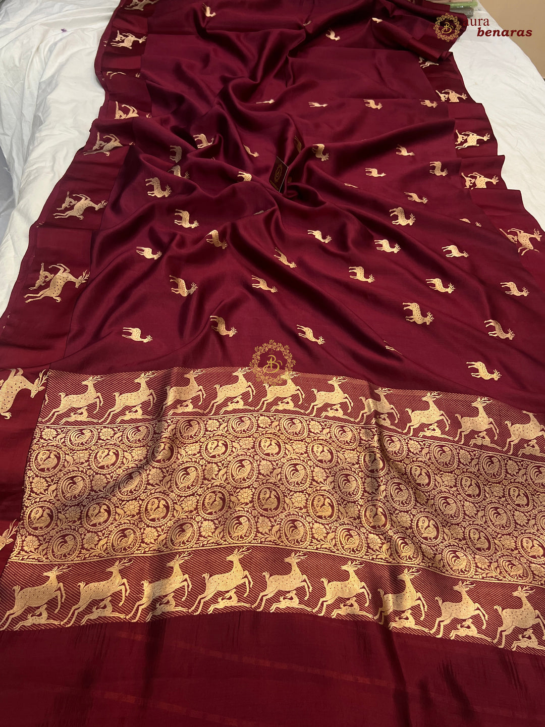 Maroon Pure Silk Banarasi Saree with Deer Motif Border