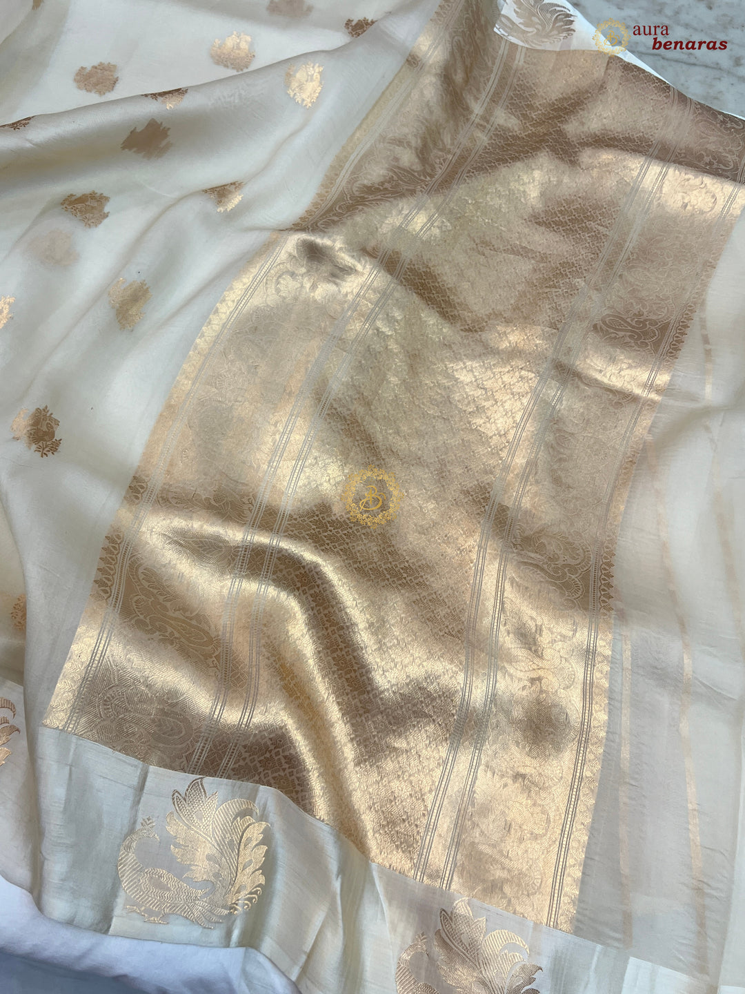 Off White Kora Silk Banarasi Saree Cow Motif Border