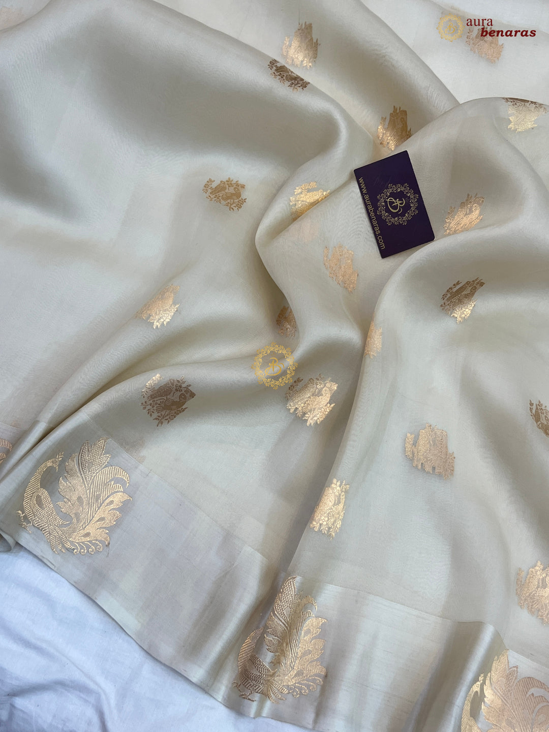 Off White Kora Silk Banarasi Saree Cow Motif Border