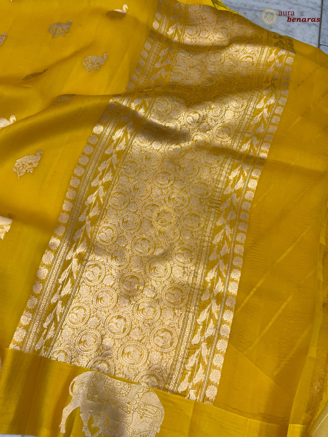 Yellow Kora Silk Banarasi Saree Cow Motif Border