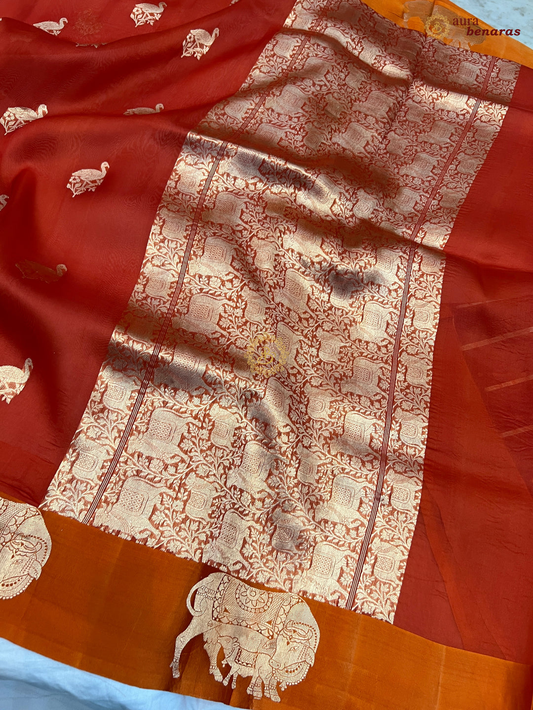 Orange Kora Silk Banarasi Saree Cow Motif Border