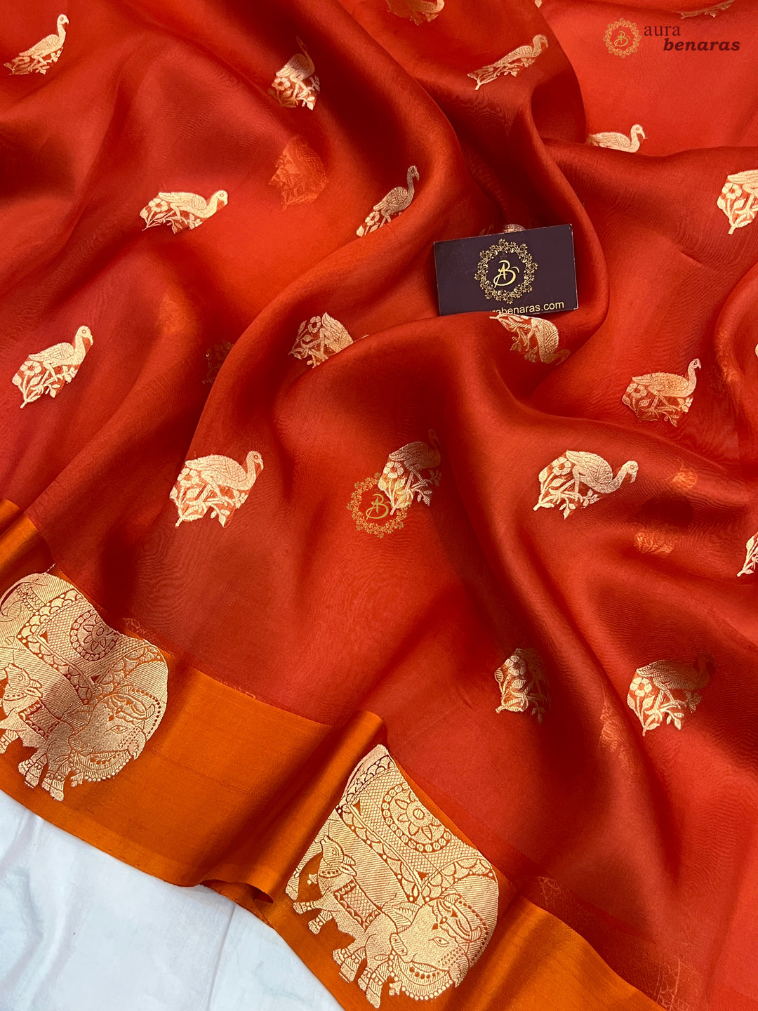Orange Kora Silk Banarasi Saree Cow Motif Border