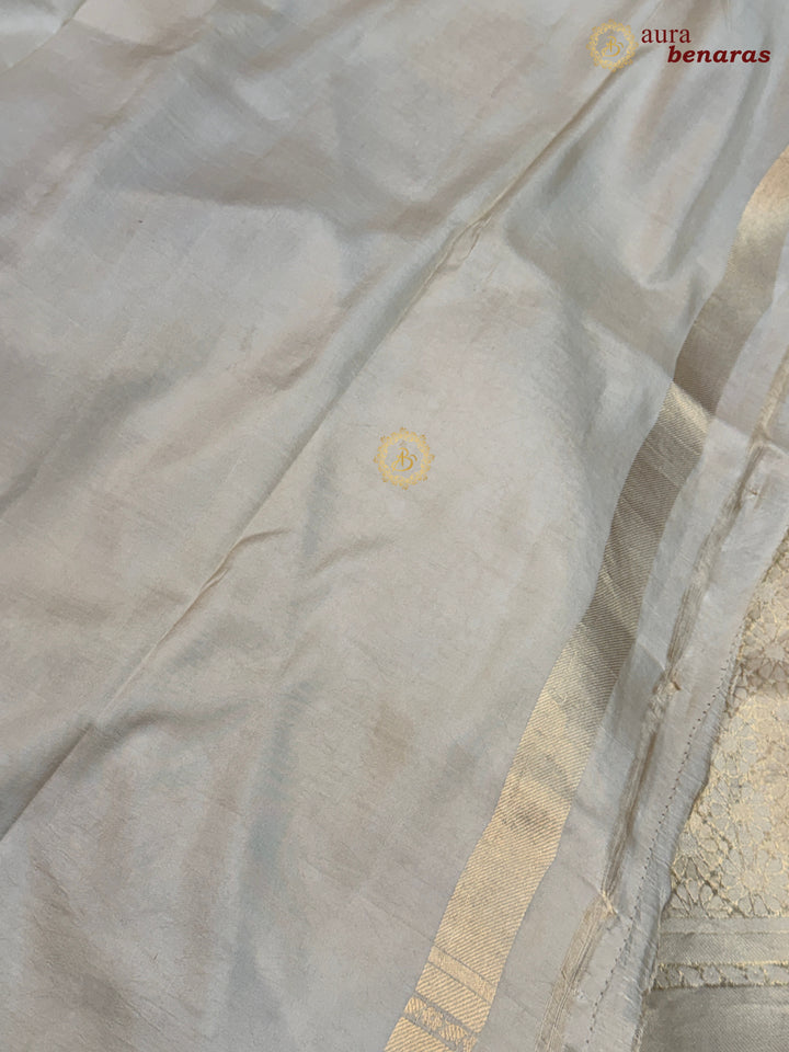 Cream Katan Silk Banarasi Saree with Floral Brocade Work
