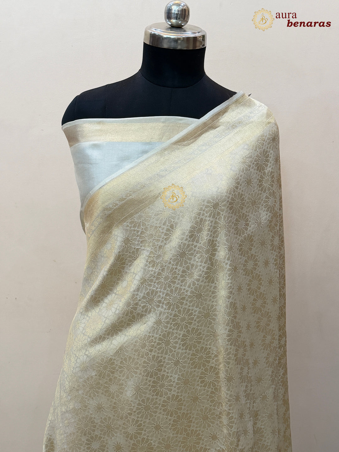 Cream Katan Silk Banarasi Saree with Floral Brocade Work