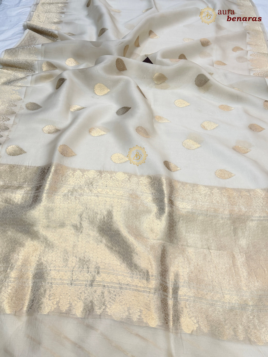 Cream Pure Kora Silk Banarasi Saree with Zari Butas & Border