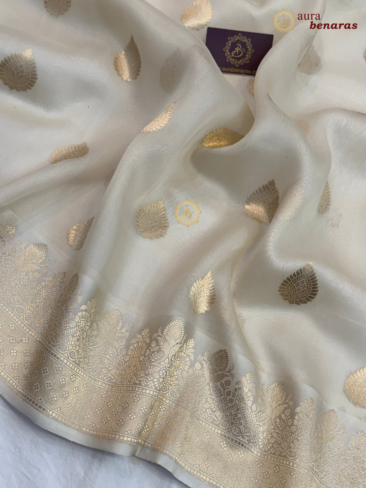 Cream Pure Kora Silk Banarasi Saree with Zari Butas & Border