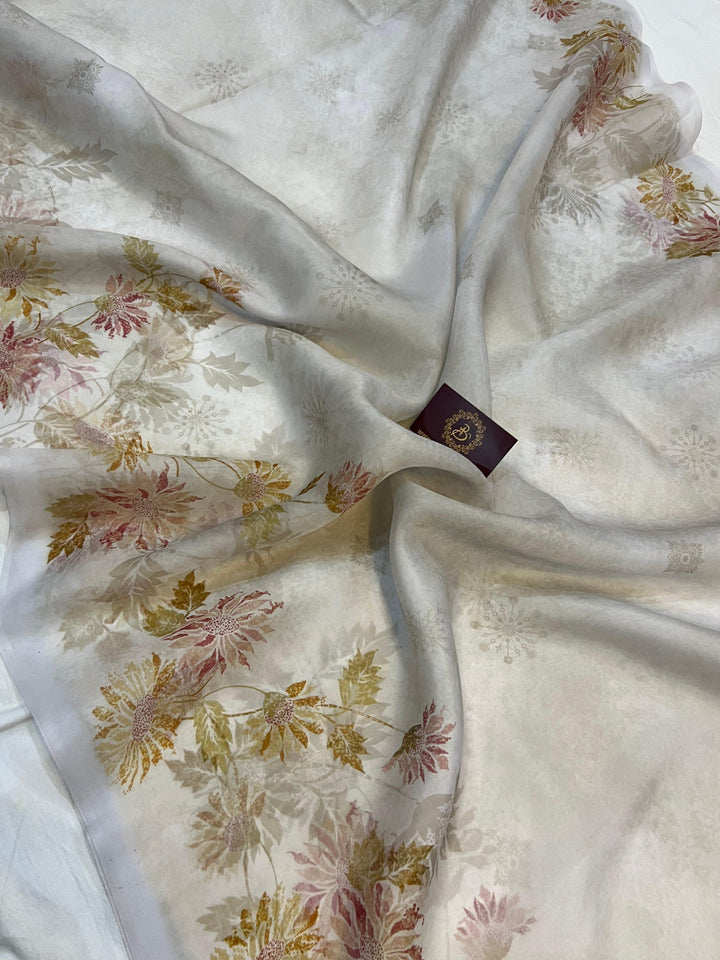 Pure Banarasi handloom Kora silk saree by Aura Benaras featuring floral digital print, designer borderless design, and a matching Chiniya silk blouse piece—perfect for festive and elegant occasions.