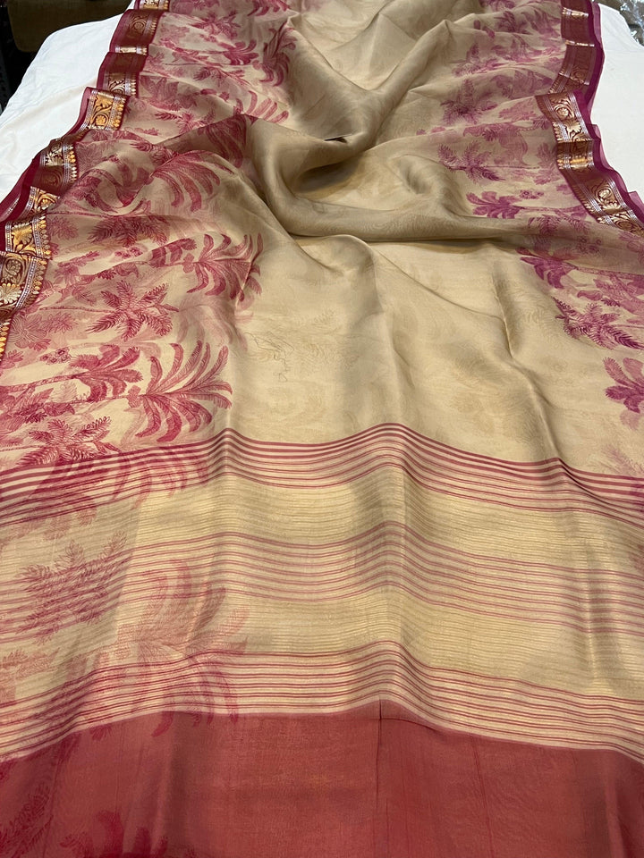 Pure Banarasi handloom Kora silk saree by Aura Benaras featuring floral digital print, designer banarasi border, and a matching Chiniya silk blouse piece—perfect for festive and elegant occasions.