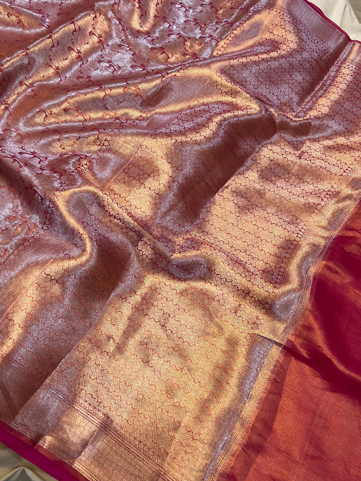 Pure Banarasi handloom tissue silk saree by Aura Benaras featuring intricate brocade work and a plain blouse piece—ideal for weddings and festive occasions