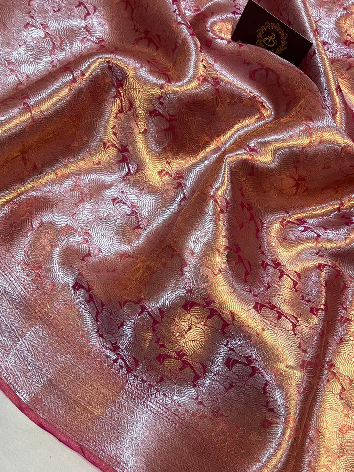 Pure Banarasi handloom tissue silk saree by Aura Benaras featuring intricate brocade work and a plain blouse piece—ideal for weddings and festive occasions