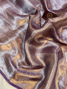 Pure Banarasi handloom tissue silk saree by Aura Benaras featuring intricate brocade work and a plain blouse piece—ideal for weddings and festive occasions.