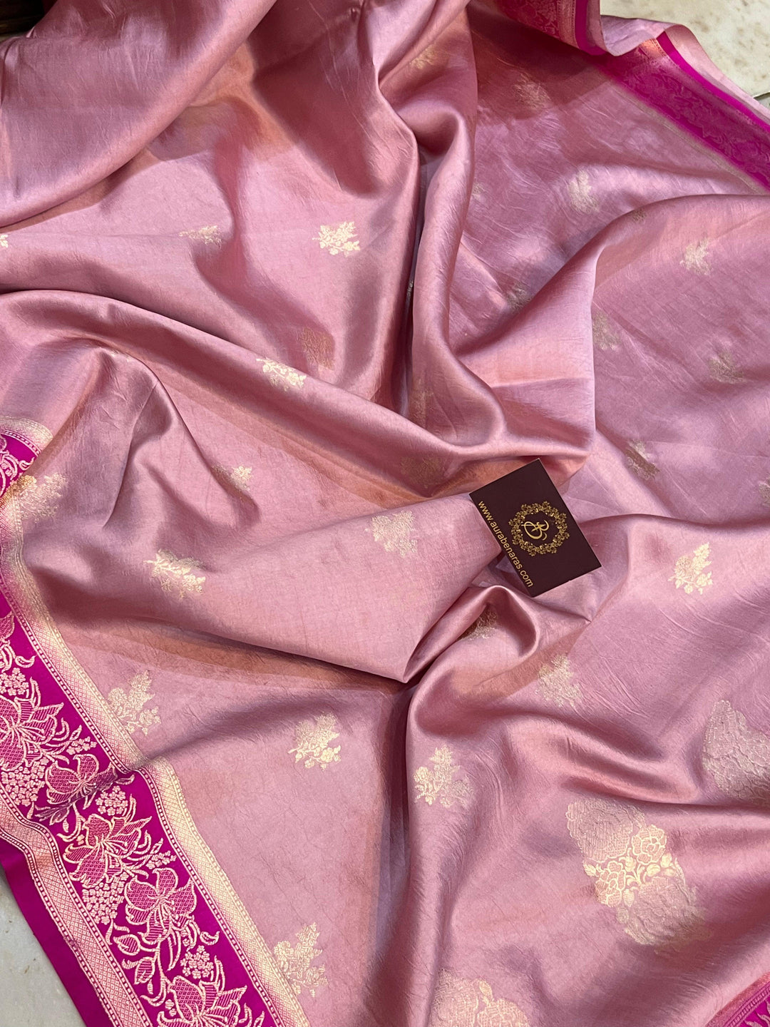 Handwoven Kadhwa floral motifs on luxurious Banarasi silk fabric
