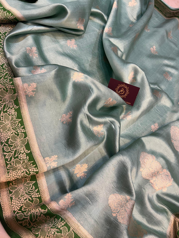 Handwoven Kadhwa floral motifs on luxurious Banarasi silk fabric
