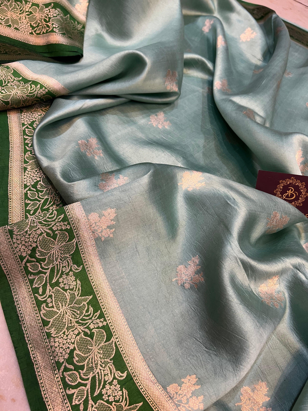 Handwoven Kadhwa floral motifs on luxurious Banarasi silk fabric