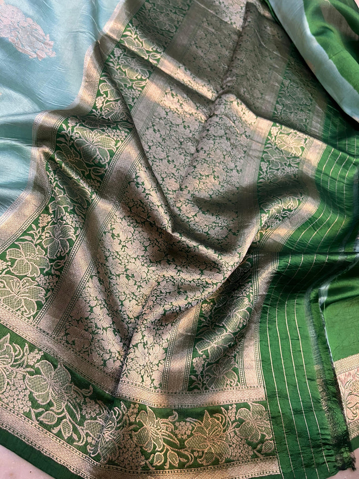 Designer pallu with intricate golden zari work on Banarasi silk saree
