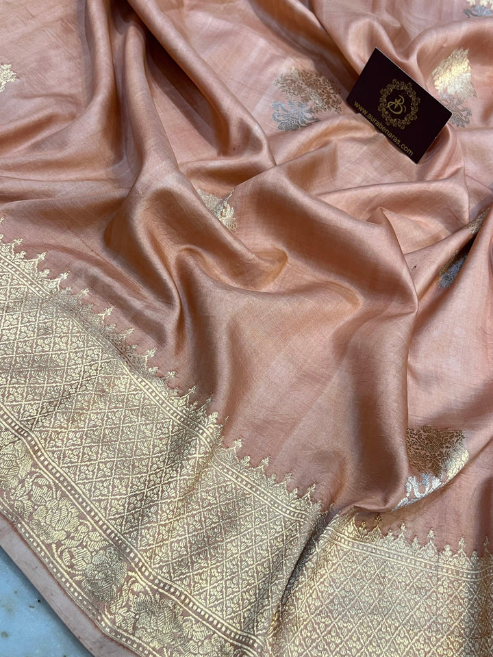 Intricate Kadhwa Sona Rupa motifs in gold and silver zari on Banarasi silk saree