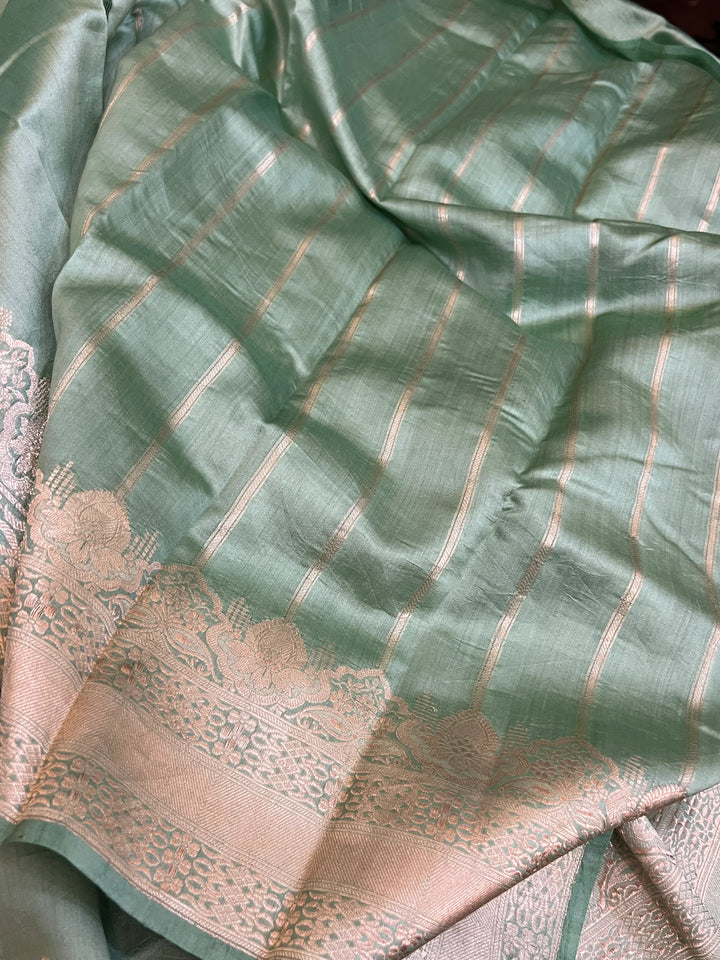Striped blouse piece that complements the Sage Green Chiniya silk Banarasi saree